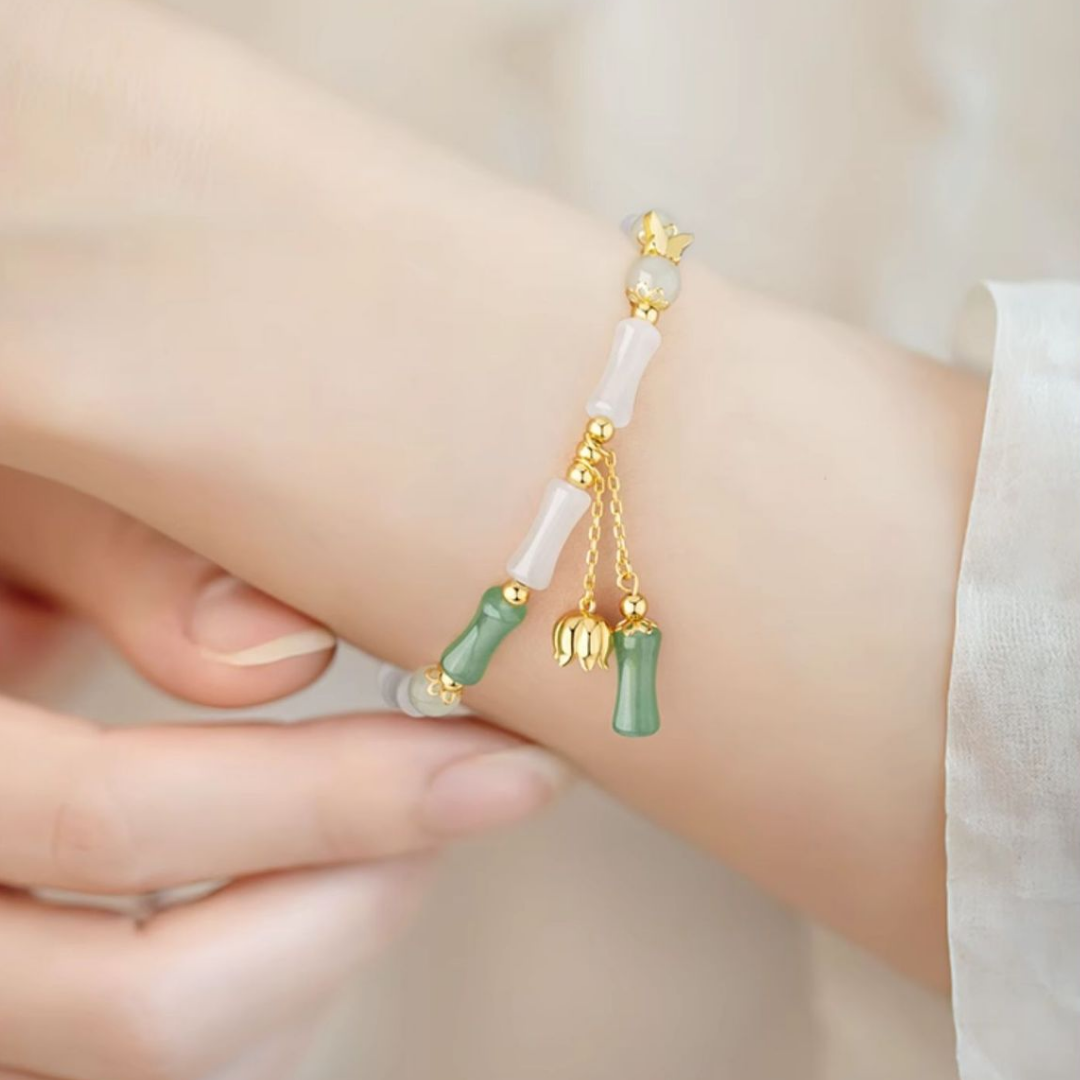 The Unyielding Grace - Cuizhu Hetian Jade Bracelet