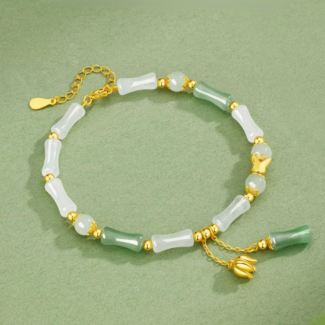 The Unyielding Grace - Cuizhu Hetian Jade Bracelet