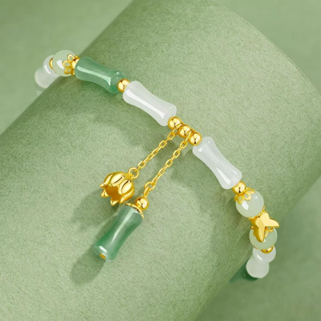 The Unyielding Grace - Cuizhu Hetian Jade Bracelet
