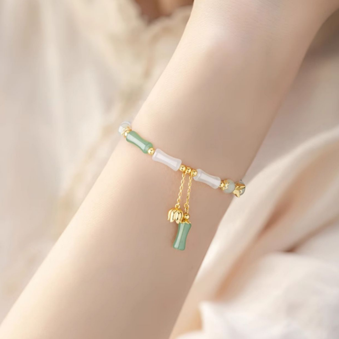 The Unyielding Grace - Cuizhu Hetian Jade Bracelet