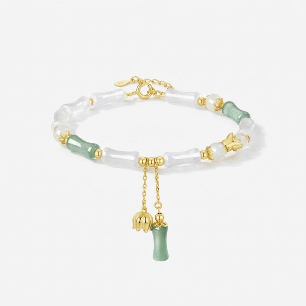 The Unyielding Grace - Cuizhu Hetian Jade Bracelet