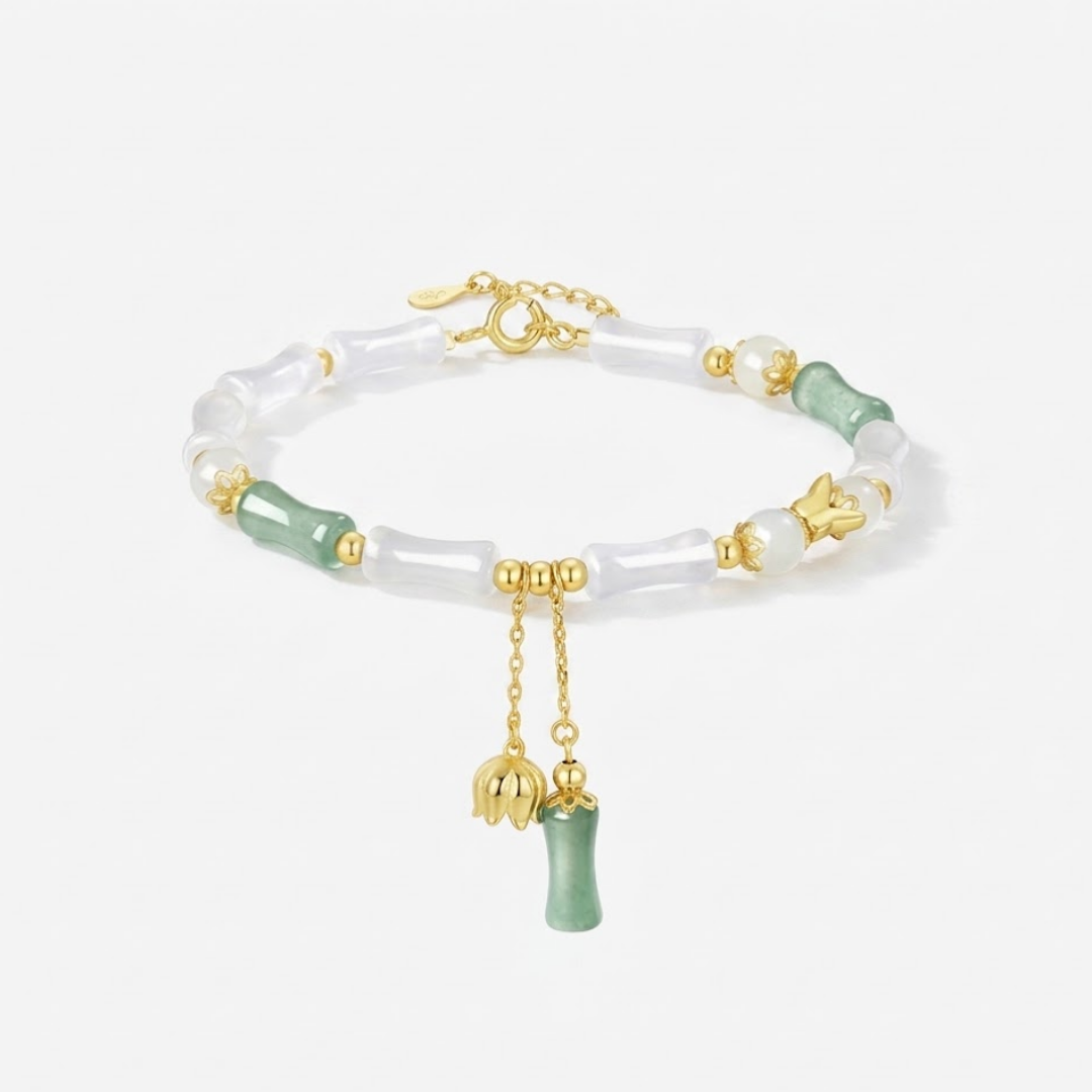 The Unyielding Grace - Cuizhu Hetian Jade Bracelet