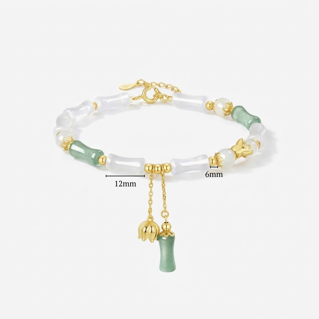 The Unyielding Grace - Cuizhu Hetian Jade Bracelet